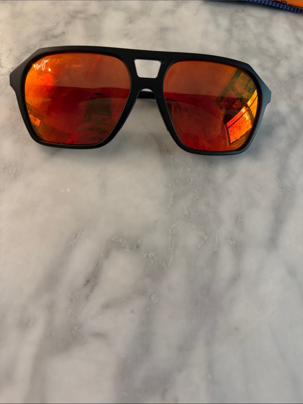 Maui Jim Black Frame Sunglasses with Red-Orange Mirrored Lenses